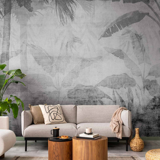 Fotobehang Vanishing jungle - landscape of exotic trees and leaves in grey tones