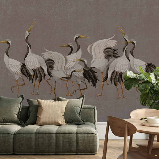 Fotobehang Crane dance – bright silhouettes of birds against a warm grey background with texture