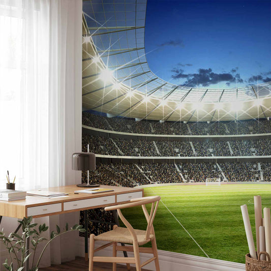 Fotobehang Football pitch - illuminated stadium with crowded stands
